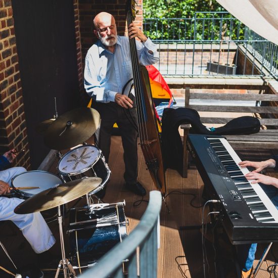 3 men playing music