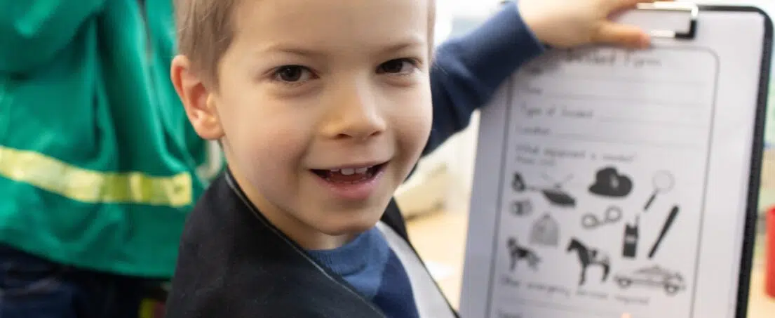 boy using clipboard