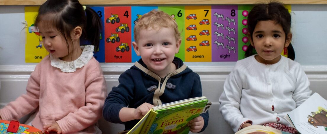 3 students reading books