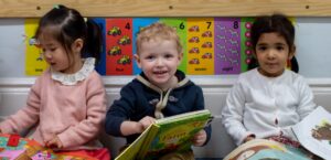 3 students reading books